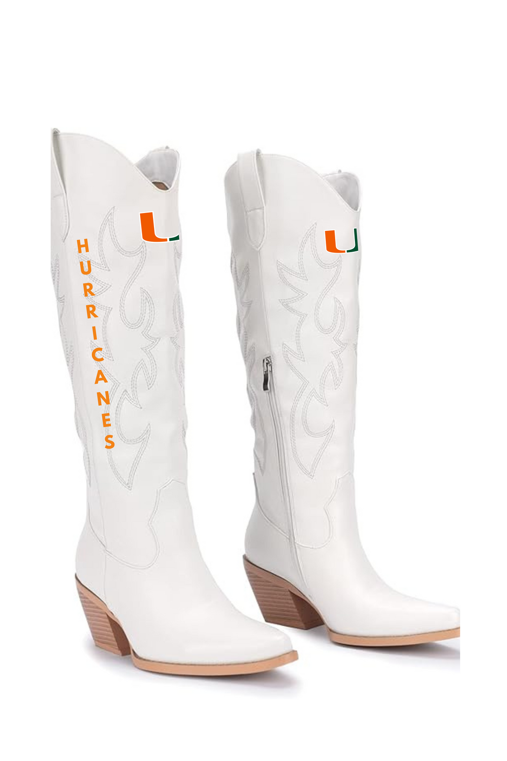 A pair of white faux leather cowboy boots featuring Miami Hurricanes 'Hurricanes' themed details, including vertical orange 'HURRICANES' text on one boot and an orange and green 'U' logo on the other. Miami Hurricanes Football Gameday